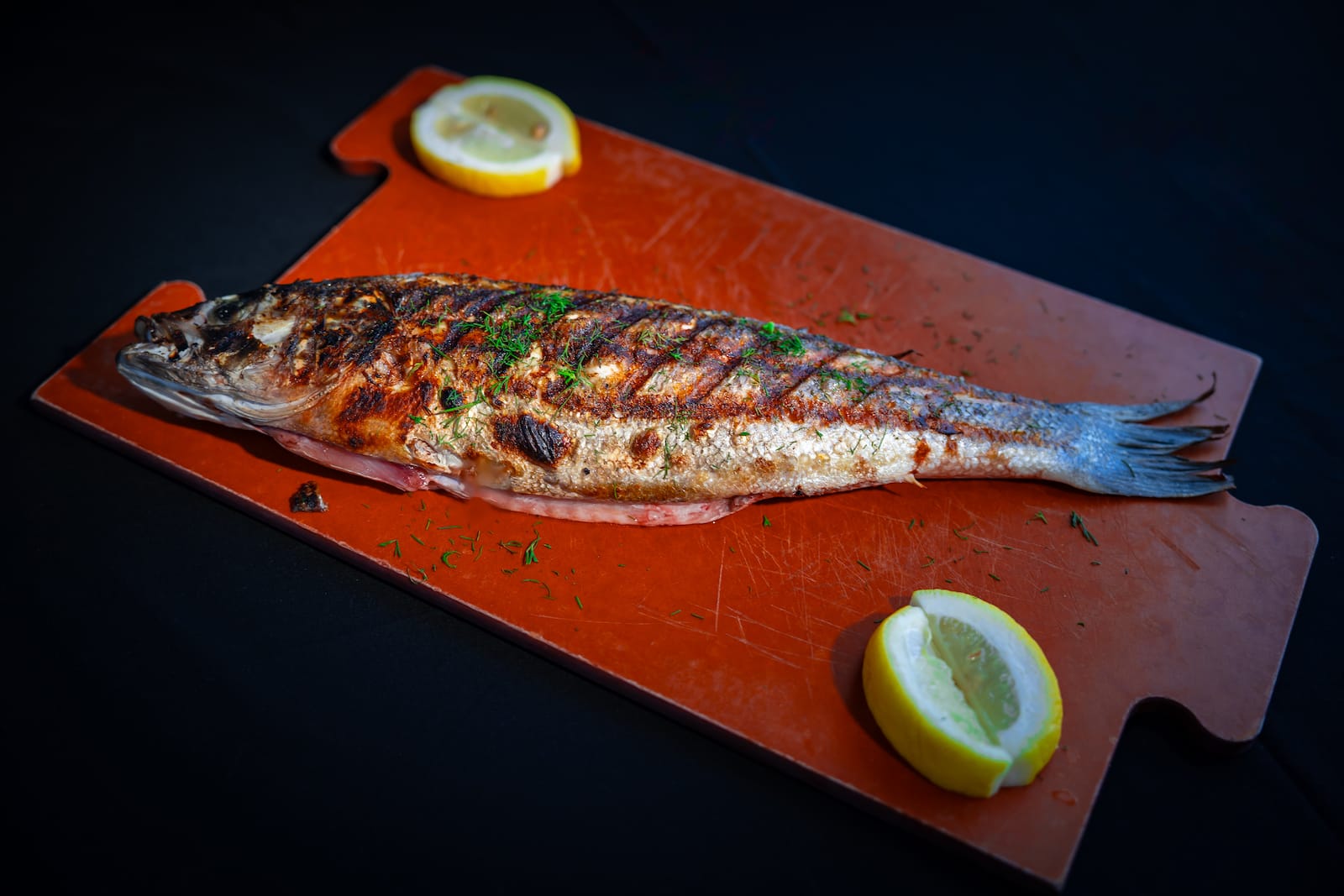 Grilled branzino European sea bass with lemon at Beso Las Vegas